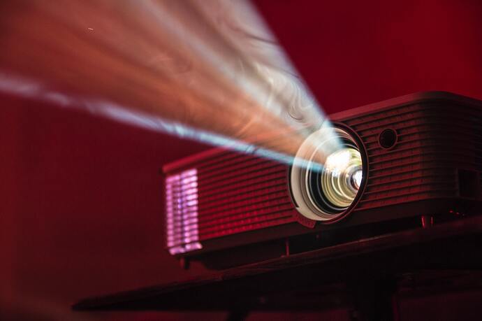 Projector lights on a red background